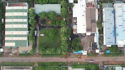 Aerial video of Warehouse and Factory in a country side of Asia.