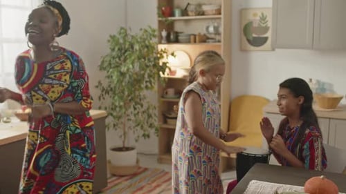Family Dances and Drums in Kitchen