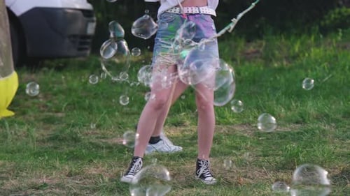 Girl Inflates Big Soap Bubbles Outdoors Leisure