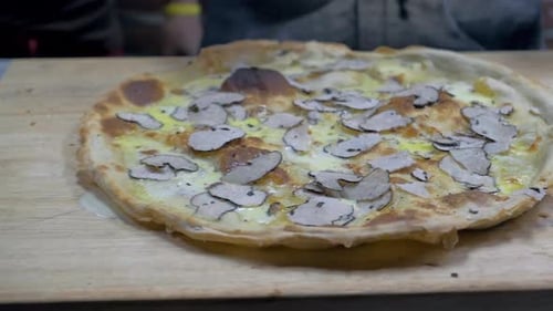 Truffle Pizza Preparation on Wooden Board
