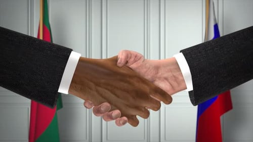 International Business Handshake with Bangladesh and Russia Flags