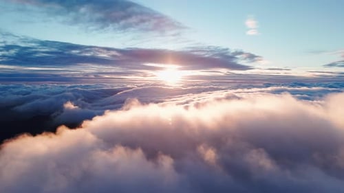 Dreamy Aerial View of Clouds at Golden Hour