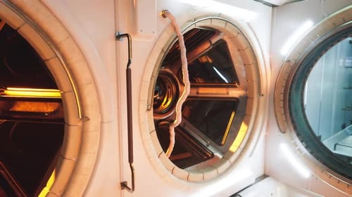 Interior View of a Futuristic Space Station Module Featuring Circular Portals