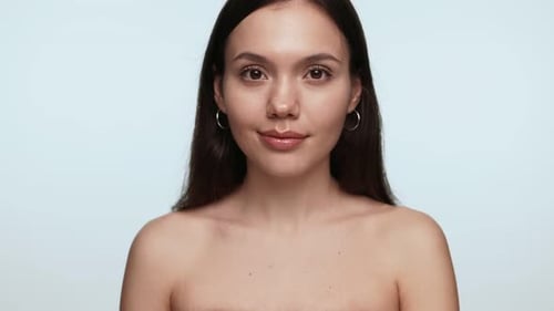 Young Adult Woman Smiling Naturally Close Up
