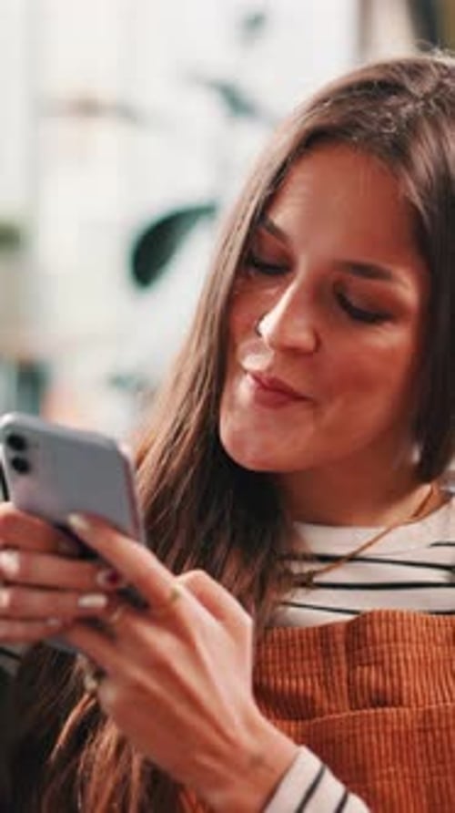 Smiling Woman Interacting with Cell Phone Portrait