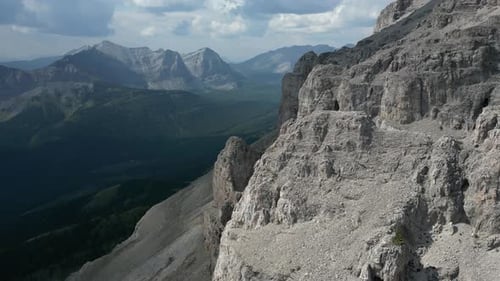 Mountain Peak with Cloudy Sky Background. Alberta, Canada.