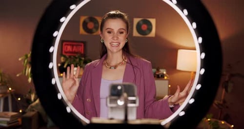 Fashion, influencer and woman with ring light in home for live streaming
