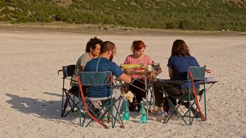 Sharing Joy and Snacks by the Ocean