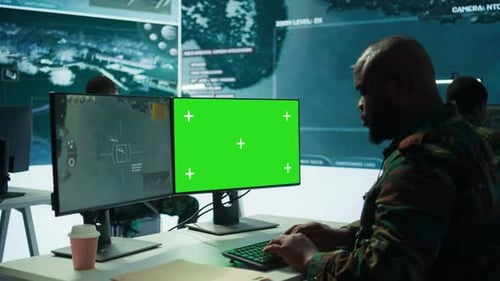 Men Working in Modern Control Center with Green Screen
