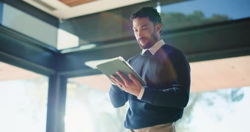 Businessman, scroll and laughing in office with tablet for funny communication