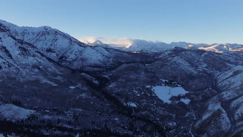 Aerial view of snow covered mountains, United States.