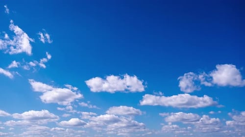 Timelapse of Cumulus Clouds Moves In The Blue Sky