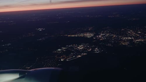 Airplane flying over city