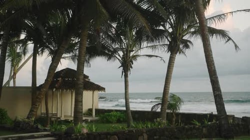 Wooden Outdoor Gazebo on Lawn of Garden with Canopy Near Luxury Retro Oceanfront Villa on Tropical