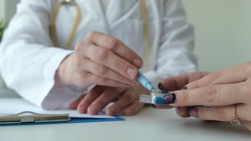 Healthcare Worker Explains Medication to Patient