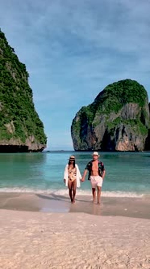 Romantic Beach Walk at Maya Bay with Stunning Limestone Cliffs in Thailand