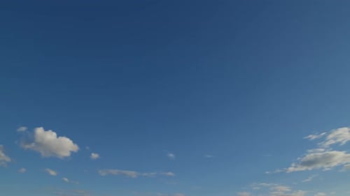 Clouds Drifting Peacefully Across the Afternoon Blue Sky