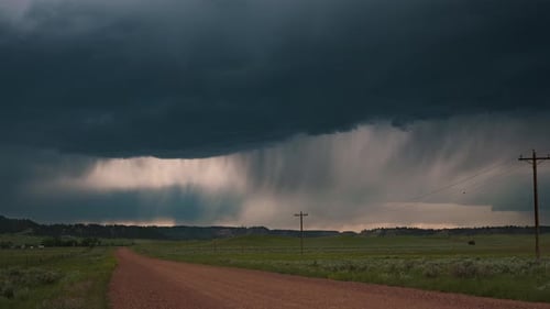 Dusty Country Road And A Dark Stormy Sky Time Lapse
