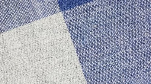 Checkered Pattern Of Blue Shades On Woven Fabric. -
