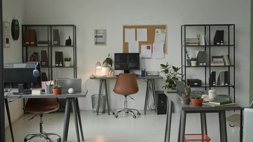 Software Development Company Office with Programmers Desks and Computers