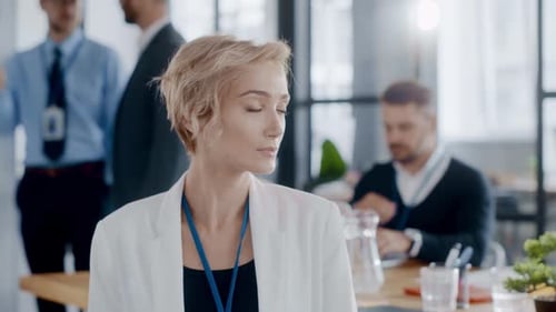 A Professional Woman Balances Focus and Leadership in Her Office