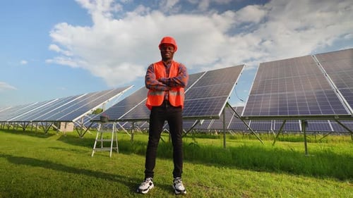 African American Engineer in Uniform in Solar Power Station