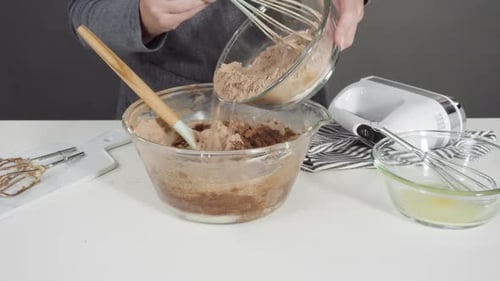 Step By Step Mixing Ingredients in a Glass Mixing Bowl to Bake Chocolate Cookies