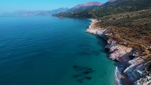 Beautiful Shoreline on the Albanian Ionian Sea, Featuring Azure Waters and a Picturesque Rocky Shore