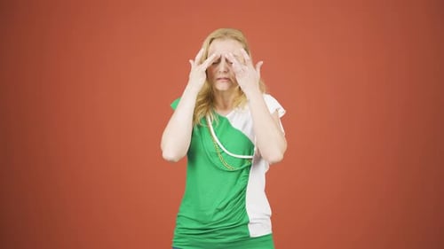 Woman Massaging Temples Due to Headache