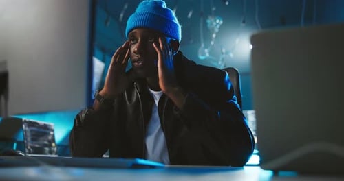 Stress, hacking and black man with mistake, computer and risk for crisis