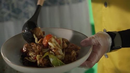 Chef Prepares Delicious Food With Ladle in Kitchen