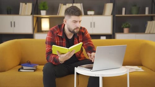 Young entrepreneur working home office.