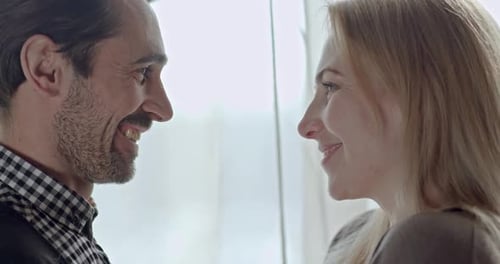 Loving Couple Leaning In For Forehead Touch