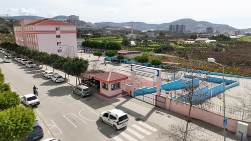 Primary School Students Playing During Break Time in the Yard Recess in Elementary School