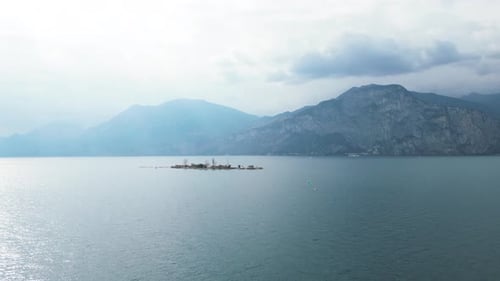 From This Aerial View Lake Garda's Tranquil Waters Seem to Go on Forever The Mountainous Terrain in