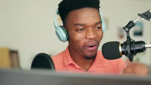 Microphone, podcast and black man speaker or DJ presenter in music radio station recording studio