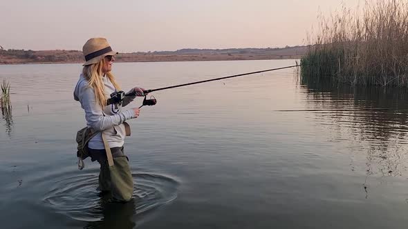Woman Fishing in Lake at Tranquil Sunrise, Sports Stock Footage ft ...