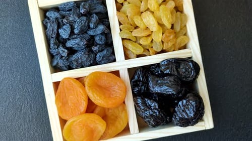 Wooden Box of Dried Apricots, Raisins, Prunes