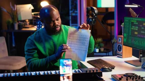 Musician Reads Sheet Music and Plays Keyboard