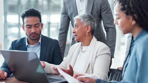 Diverse Colleagues Collaborating Together in Modern Office