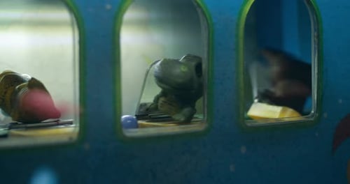 Detailed static shot of colorful plastic balls aimed to knock over small toys at carnival