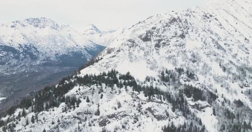 Aerial view on Snowy mountains in Alaska