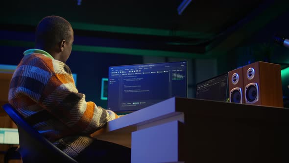 Black Software Engineer Writes Complex Binary Code Scripts on Computer ...