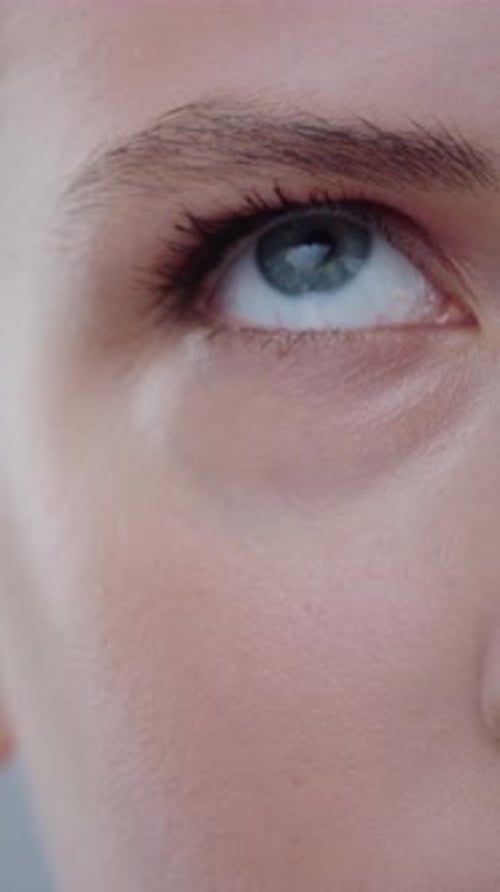 A Detailed CloseUp of an Eye That Captivates and Reflects Both Beauty and Deep Emotion