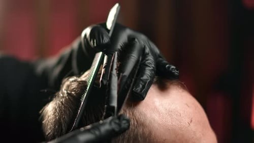 Man Getting a Haircut Close Up in Barbershop