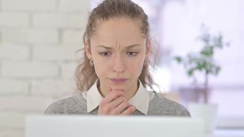 Close up of Face of Serious Young Male Looking at the Camera