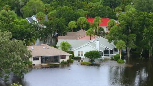 Flooded Residential Area with Underwater Houses From Hurricane Rainfall Water in Florida Suburban