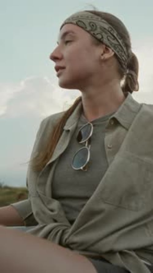 Caucasian Girl Traveling in Truck Trunk on Country Road