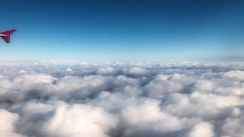 Sunrise Above Clouds From Airplane Window