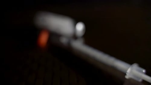 Close Up of Syringe and Vial